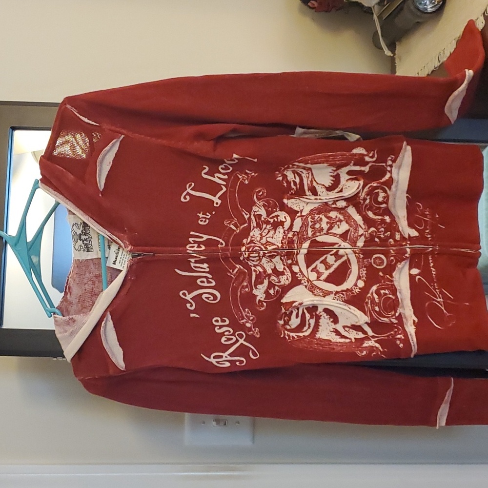 Zip up light Hoodie from buckle. Still has tags. Never worn.